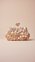 Embellished clutch bag in meringue